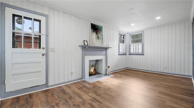 216 Coosawattee Ave SW, Rome, GA 30165 - unfurnished living room with wood finished floors, a fireplace with flush hearth, and baseboards
