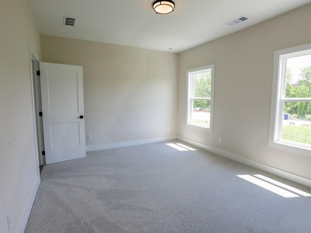 1415 Coretta Bnd, Atlanta, GA 30318 - carpeted spare room with healthy amount of natural light and baseboards