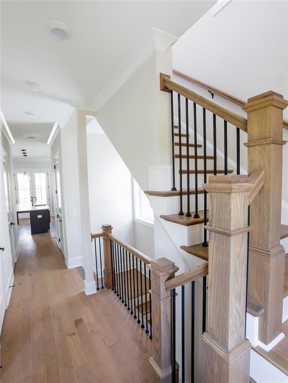 1415 Coretta Bnd, Atlanta, GA 30318 - stairs featuring hardwood / wood-style flooring and baseboards