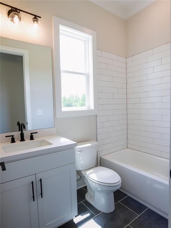 1415 Coretta Bnd, Atlanta, GA 30318 - bathroom featuring tile patterned floors, toilet, and vanity