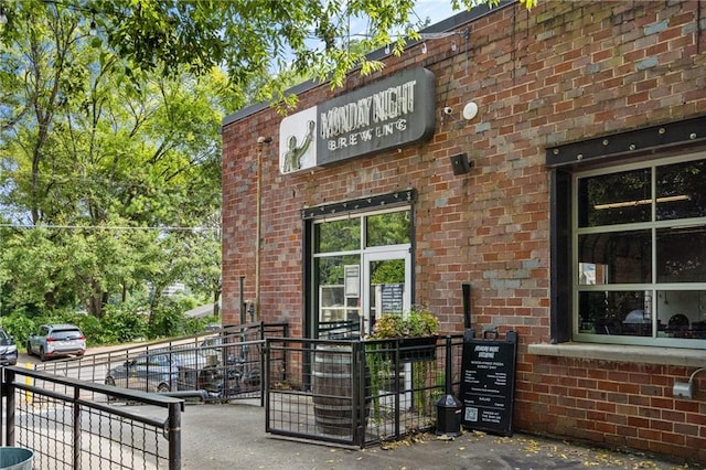1415 Coretta Bnd, Atlanta, GA 30318 - entrance to property featuring brick siding and fence
