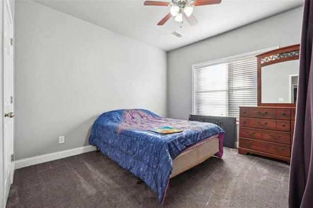 bedroom featuring ceiling fan, carpet floors, visible vents, and baseboards