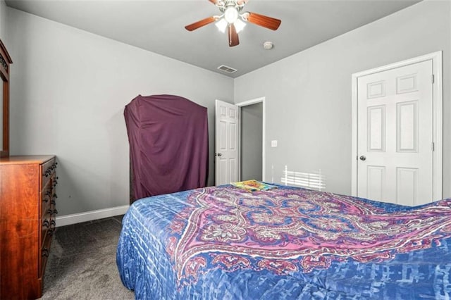 carpeted bedroom featuring baseboards, visible vents, and a ceiling fan