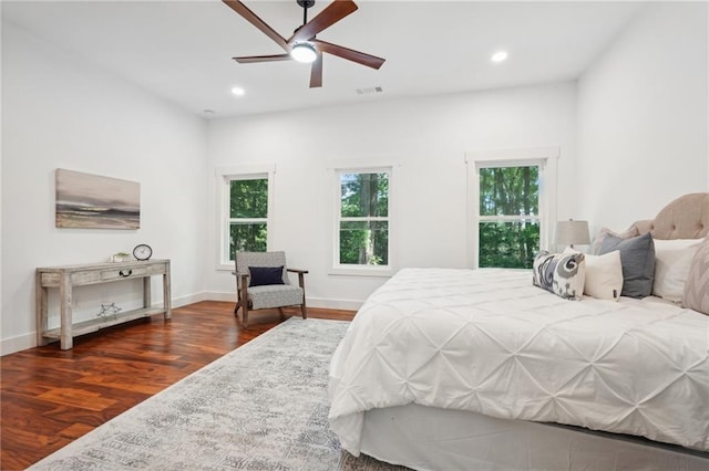 bedroom featuring recessed lighting, dark wood-style floors, visible vents, and baseboards