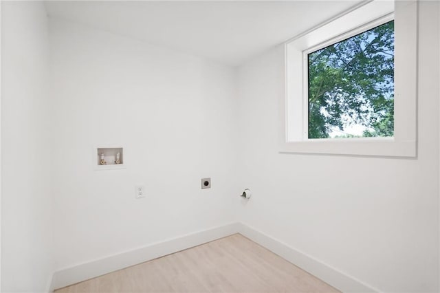 laundry room featuring washer hookup, light wood-style flooring, baseboards, hookup for an electric dryer, and laundry area