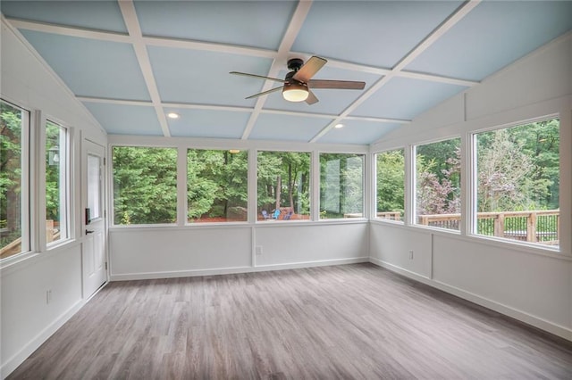 3323 Lancing Ct, Duluth, GA 30096 - unfurnished sunroom with plenty of natural light, wood finished floors, baseboards, lofted ceiling, and a wooden deck