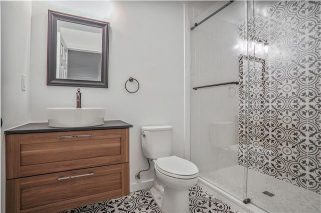 3323 Lancing Ct, Duluth, GA 30096 - full bath featuring vanity, toilet, an enclosed shower, baseboards, and tile patterned flooring