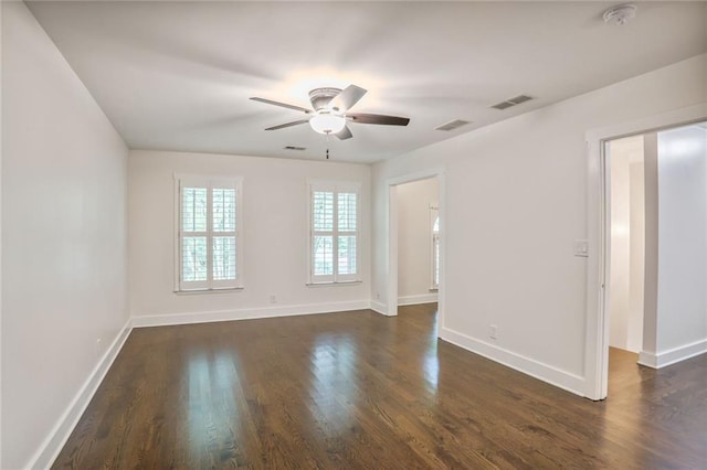 3323 Lancing Ct, Duluth, GA 30096 - spare room with a ceiling fan, a smoke detector, baseboards, and dark wood-style floors