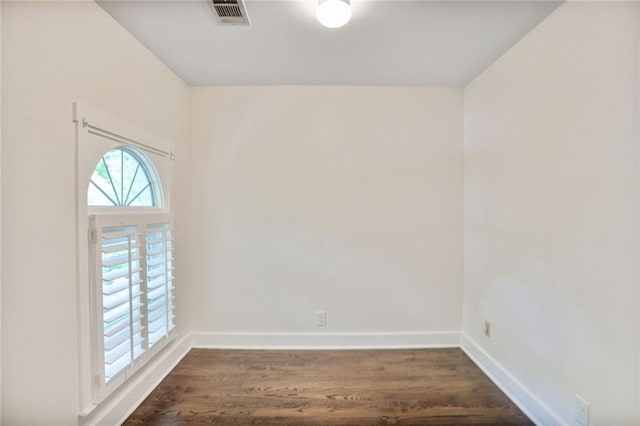 3323 Lancing Ct, Duluth, GA 30096 - empty room featuring dark wood-style floors and baseboards