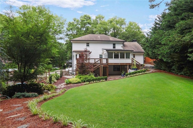 3323 Lancing Ct, Duluth, GA 30096 - back of property featuring stairs, a sunroom, and a deck