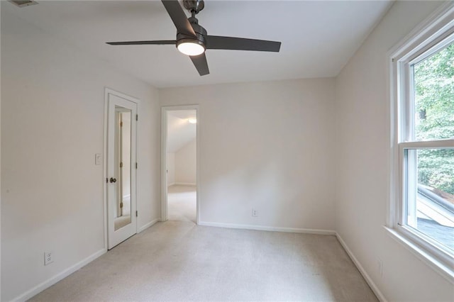 3323 Lancing Ct, Duluth, GA 30096 - empty room featuring plenty of natural light, light carpet, and ceiling fan