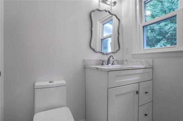 3323 Lancing Ct, Duluth, GA 30096 - half bathroom featuring toilet and vanity