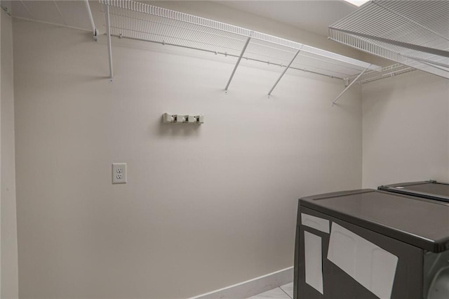 3323 Lancing Ct, Duluth, GA 30096 - laundry area featuring baseboards