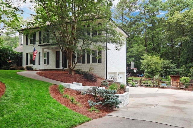 3323 Lancing Ct, Duluth, GA 30096 - view of front of house featuring brick siding, a garage, concrete driveway, and a front lawn