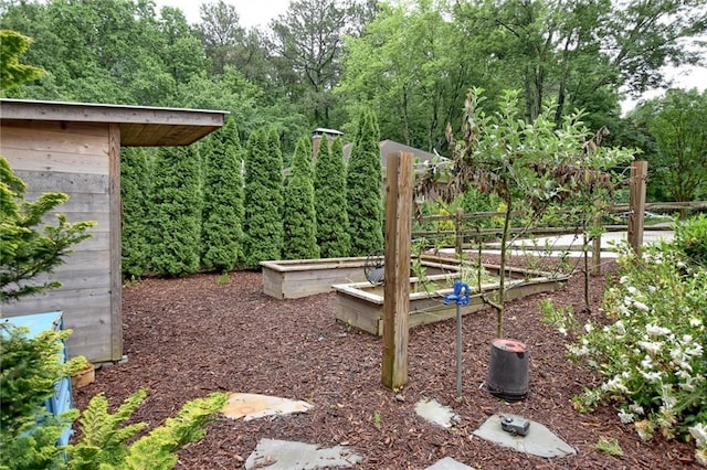 3323 Lancing Ct, Duluth, GA 30096 - view of yard featuring a vegetable garden