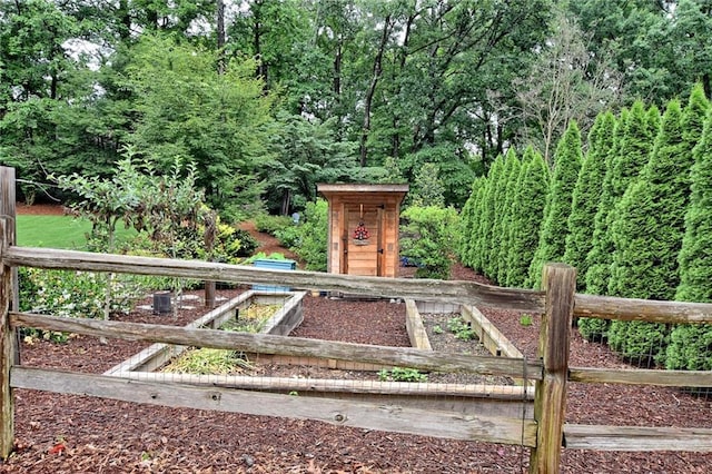 3323 Lancing Ct, Duluth, GA 30096 - view of yard featuring a vegetable garden