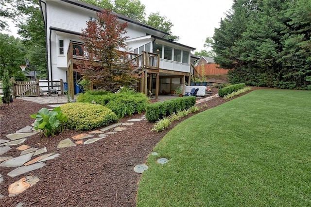 3323 Lancing Ct, Duluth, GA 30096 - rear view of property featuring a sunroom, a patio, and a deck