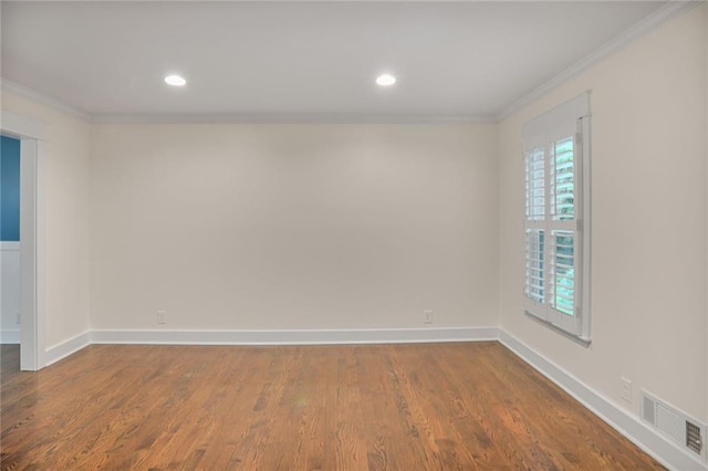 3323 Lancing Ct, Duluth, GA 30096 - spare room featuring ornamental molding, baseboards, dark wood-style floors, and recessed lighting