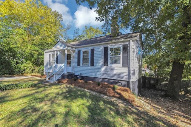 view of front of home with a front yard