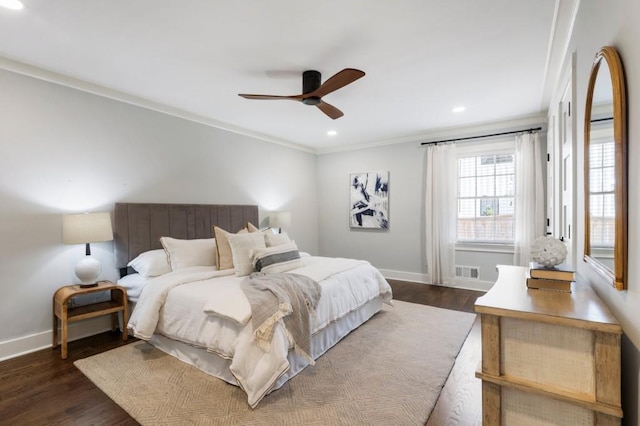 bedroom featuring visible vents, baseboards, and dark wood-style flooring