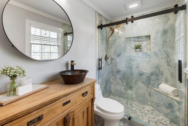 full bathroom with vanity, crown molding, toilet, and a marble finish shower