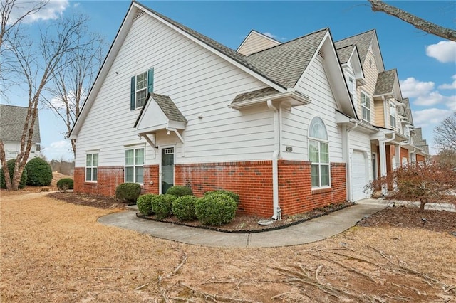 view of home's exterior featuring a garage