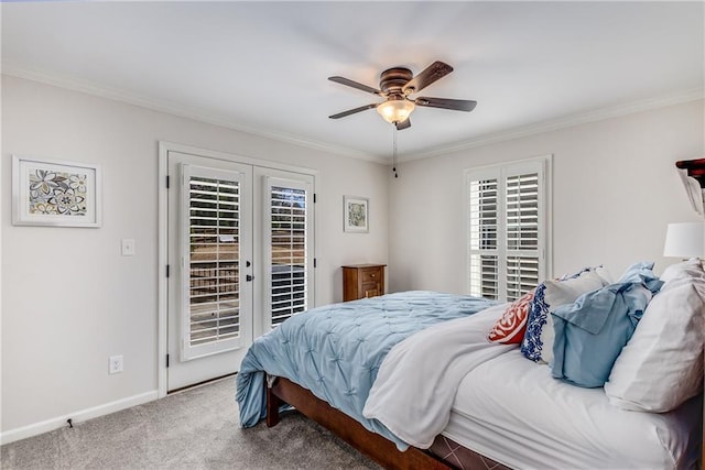 bedroom featuring ornamental molding, access to outside, french doors, and carpet