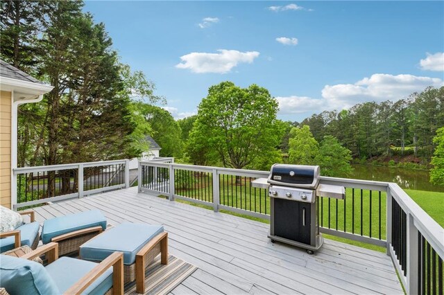 4790 Hyde Rd, Cumming, GA 30040 - wooden terrace with a lawn, a forest view, and area for grilling