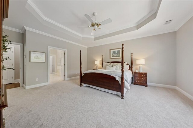 4790 Hyde Rd, Cumming, GA 30040 - bedroom featuring a tray ceiling, light colored carpet, and ornamental molding
