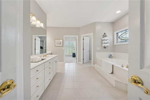 4790 Hyde Rd, Cumming, GA 30040 - full bathroom with a bath, baseboards, vanity, and tile patterned flooring