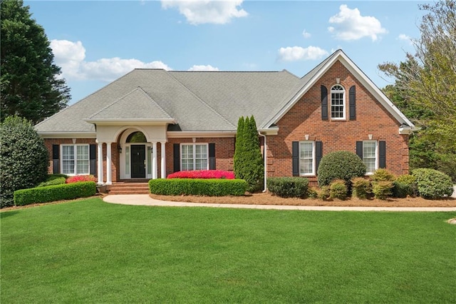 4790 Hyde Rd, Cumming, GA 30040 - view of front of home with brick siding and a front yard