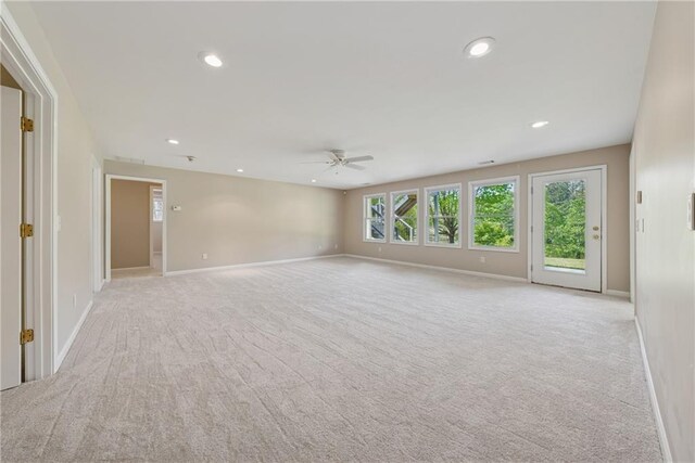 4790 Hyde Rd, Cumming, GA 30040 - unfurnished room with recessed lighting, baseboards, a ceiling fan, and light colored carpet