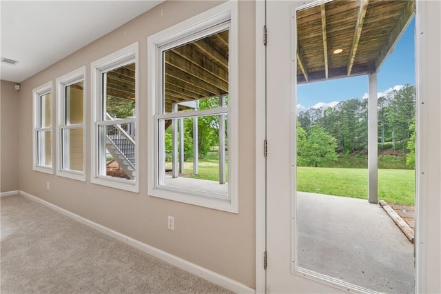 4790 Hyde Rd, Cumming, GA 30040 - doorway featuring carpet, a wealth of natural light, baseboards, and visible vents