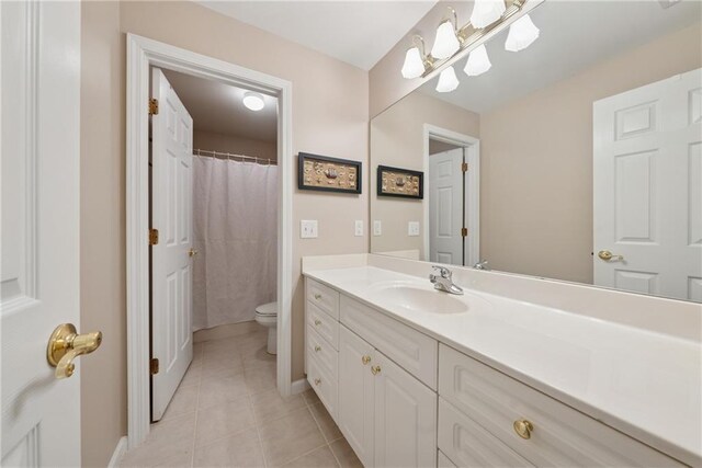 4790 Hyde Rd, Cumming, GA 30040 - full bath featuring tile patterned flooring, vanity, and toilet