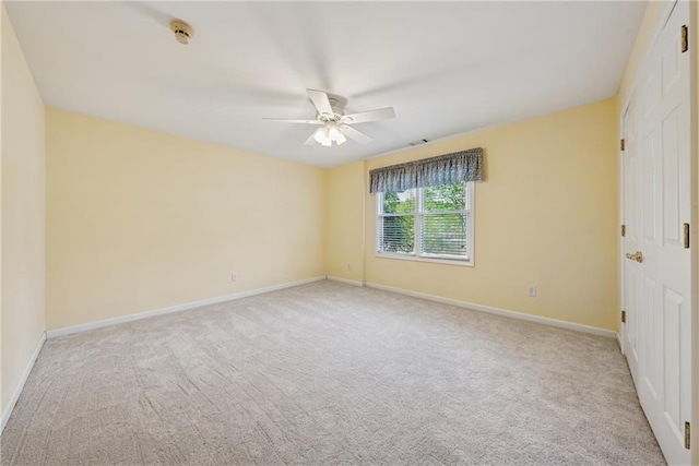 4790 Hyde Rd, Cumming, GA 30040 - carpeted spare room featuring baseboards, a ceiling fan, and visible vents