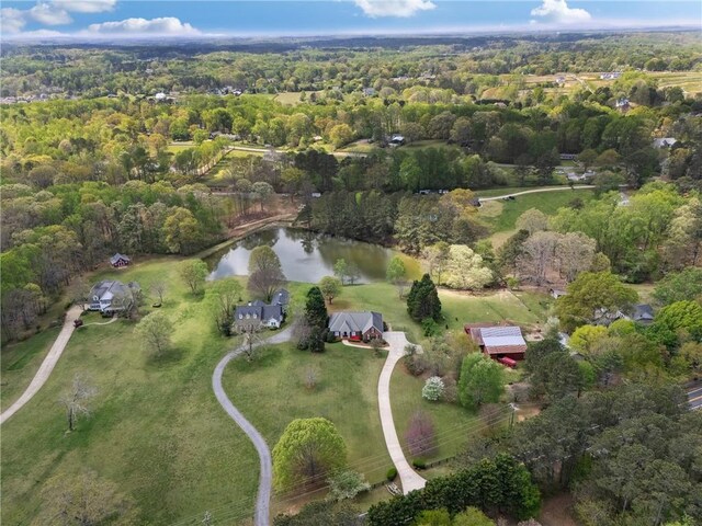 4790 Hyde Rd, Cumming, GA 30040 - drone / aerial view with a view of trees and a water view