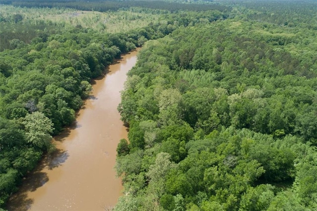 bird's eye view featuring a forest view