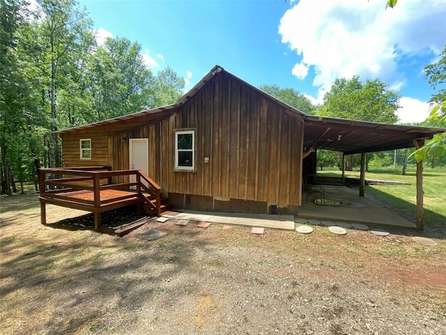 exterior space with a deck and crawl space