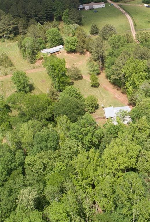 drone / aerial view with a forest view