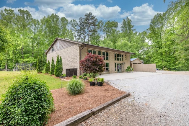 659 Creek Nation Rd, Jefferson, GA 30549 - view of front of house with a patio area and stone siding
