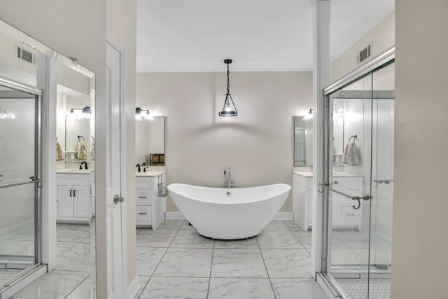 659 Creek Nation Rd, Jefferson, GA 30549 - bathroom with marble finish flooring, a soaking tub, vanity, and a shower stall