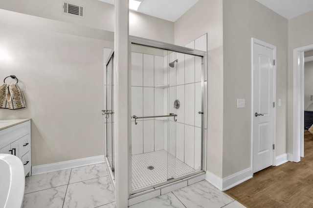 659 Creek Nation Rd, Jefferson, GA 30549 - bathroom featuring marble finish floors, a stall shower, and vanity