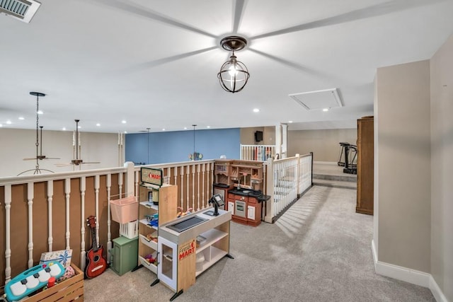 659 Creek Nation Rd, Jefferson, GA 30549 - hallway featuring carpet floors, attic access, recessed lighting, and an upstairs landing
