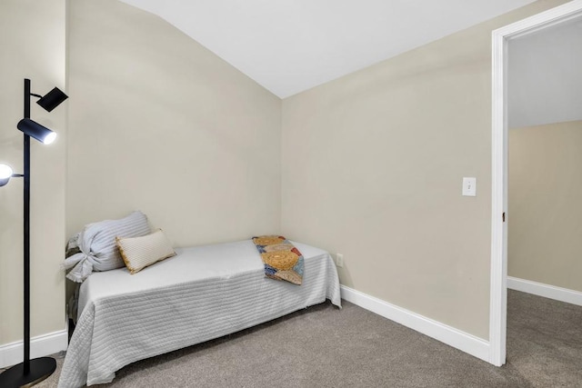 659 Creek Nation Rd, Jefferson, GA 30549 - bedroom with lofted ceiling and carpet flooring