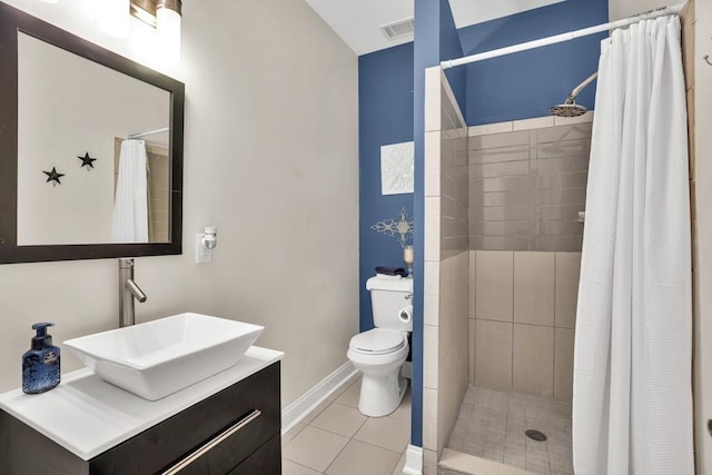 659 Creek Nation Rd, Jefferson, GA 30549 - bathroom with vanity, tiled shower, and tile patterned flooring