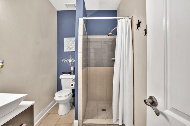 659 Creek Nation Rd, Jefferson, GA 30549 - bathroom with tiled shower, tile patterned flooring, and vanity