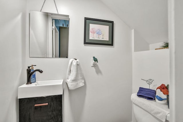 659 Creek Nation Rd, Jefferson, GA 30549 - half bathroom with vanity and vaulted ceiling
