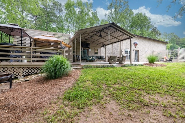 659 Creek Nation Rd, Jefferson, GA 30549 - back of house featuring a deck, outdoor lounge area, a patio area, and a gazebo