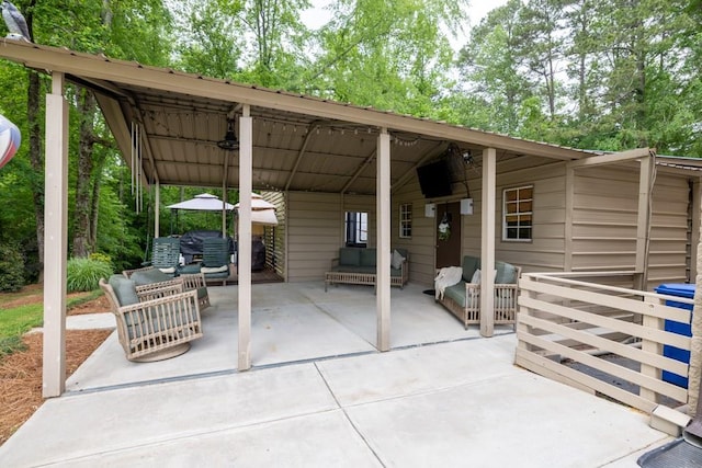 659 Creek Nation Rd, Jefferson, GA 30549 - view of patio / terrace featuring an outdoor hangout area and a carport