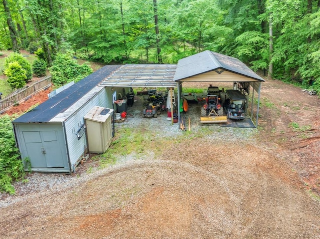 659 Creek Nation Rd, Jefferson, GA 30549 - exterior space featuring driveway, a view of trees, and a detached carport